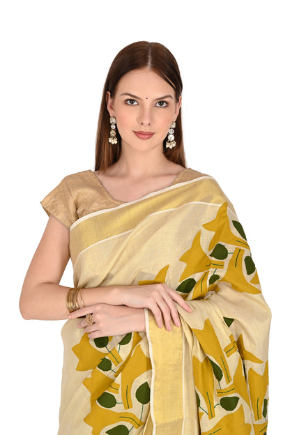 Handmade Cream Saree with Golden-Yellow Floral Applique & Tassel Detailing – Artisan Cotton Elegance
